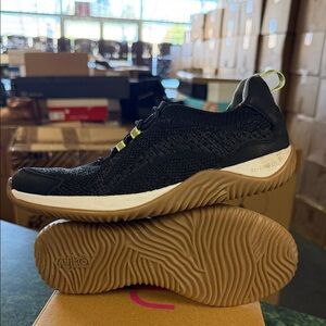 Ryka Black Knit Athletic Sneaker with Gum Sole and Yellow Accents